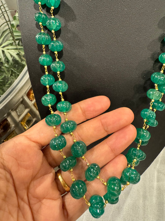 Emerald pumpkin carving in chain necklace