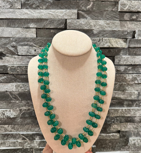 Emerald pumpkin carving in chain necklace